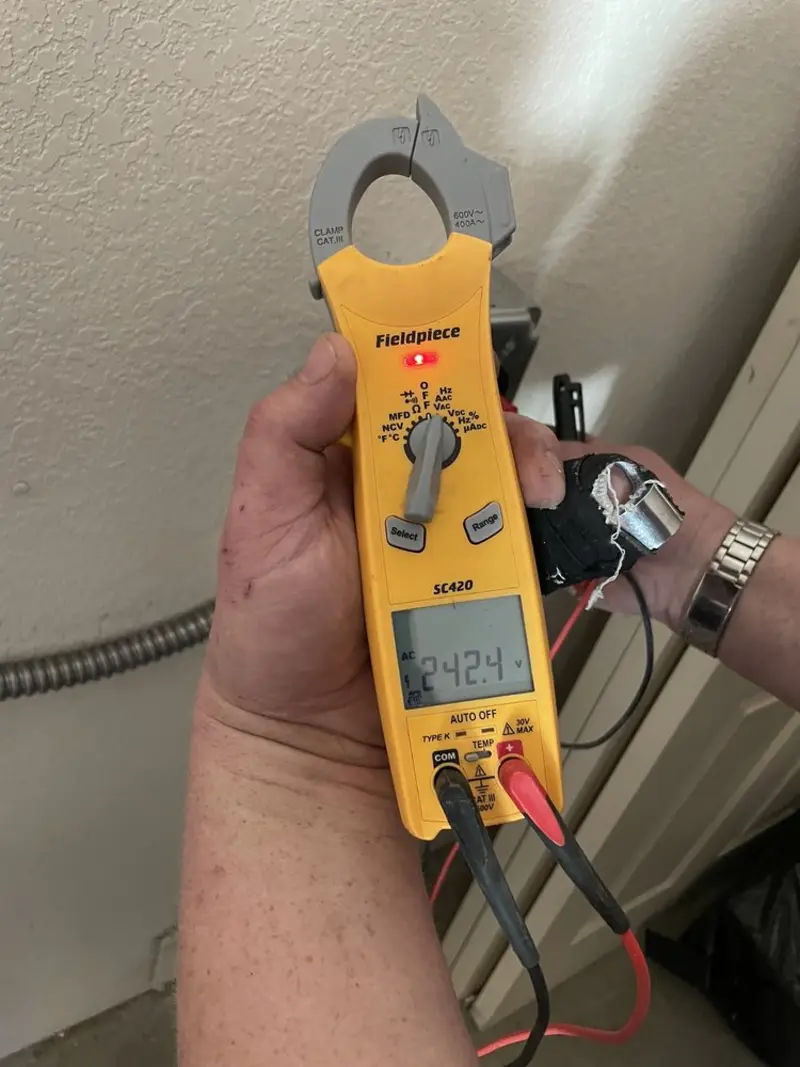 Voltage testing with clamp meter during Recessed Lighting Installation in Black Mountain